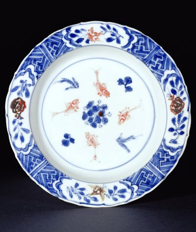 Plate decorated in underglaze blue with touches of copper red, late Ming dynasty, c.1630 by Chinese School